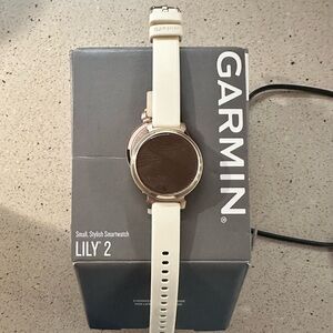 Garmin Cream Smartwatch with Circular Display